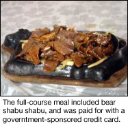 The full-course meal included bear shabu shabu, paid for by a government-sponsored credit card